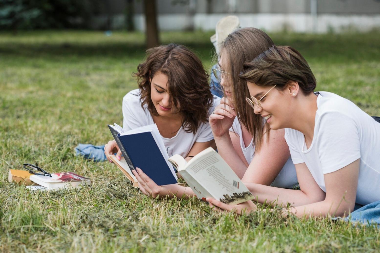 Professional workspace with business planning materials and digital resources